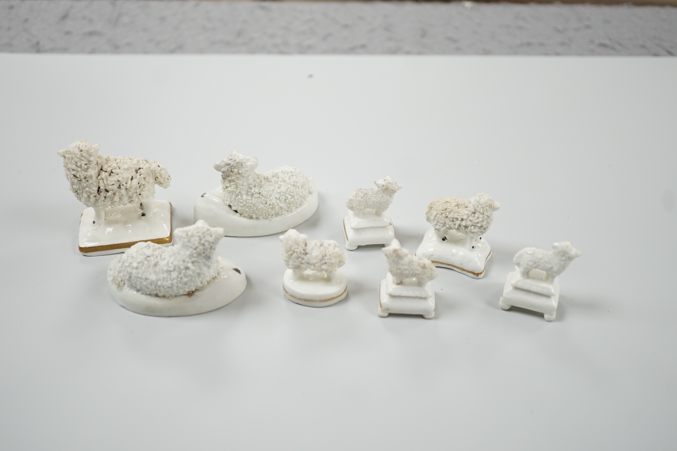 Three small Staffordshire models of sheep, together with five toy Staffordshire models of sheep, c.1830-50 (8). Tallest 5cm, Provenance: Dennis G.Rice collection